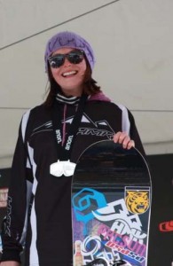 Chloe Banning '14 on the podium at the USASA Nationals. Note the CC Tiger sticker on her snowboard.