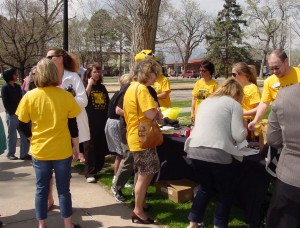 The Wellness Team set up a table with food, water, and giveaways