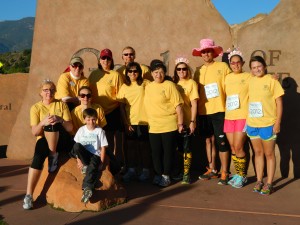 CC's Race for the Cure team includes, standing, left to right, Lyrae Williams (president’s office), Jennifer Supinski (registrar’s office), Stan Supinski, Linda LaBue (physics), Enedina Andrews, Karen Britton (registrar’s office), Tom Skipworth, Terri Skipworth (registrar’s office), Audrey Burns, and seated on rock, Candace Santa Maria (registrar’s office), Amy Ingalsbe (business office), and Jordan Ingalsbe. Teammates not pictured are Veronica Paulsen, Liz Scherkenbach (information management), Garrett Scherkenbach, Piper Scherkenbach and  Garret Scherkenbach.