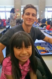 Teddy Rose with student during lunch