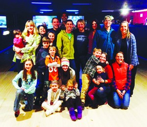 “The Fun Kids” — eight CC graduates, their spouses and 10 future CC students — gathered in Colorado’s Summit County for skiing and “badass bowling.” Front row, left to right: Lucy and Monty Bonz. Second row, kneeling: Lilah Hughes, Emma Bonz, Raleigh Coburn ’94 with James and Scarlet McElrea, and Mandy Elliman Bonz ’95. Third row, standing: Vincent and Desmond Mangat. Back row: Julia and Lindsay Mangat, Erin Bonz, Cole Hughes, Rob Bonz ’94, Kishen Mangat ’96, Jay Bonz ’95, Yuri Kostick ’94, Sacha Kostick, Bosier Parsons ’95, and Dana Abrums Hughes ’95.