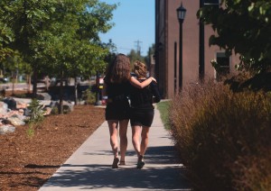 Zascha Fox ’19, left, and her mother Dell Fox make their way past the new Cache La Poudre Street Improvement Project and the Spencer Center to have lunch at Wooglin’s Deli during Family Weekend in October.