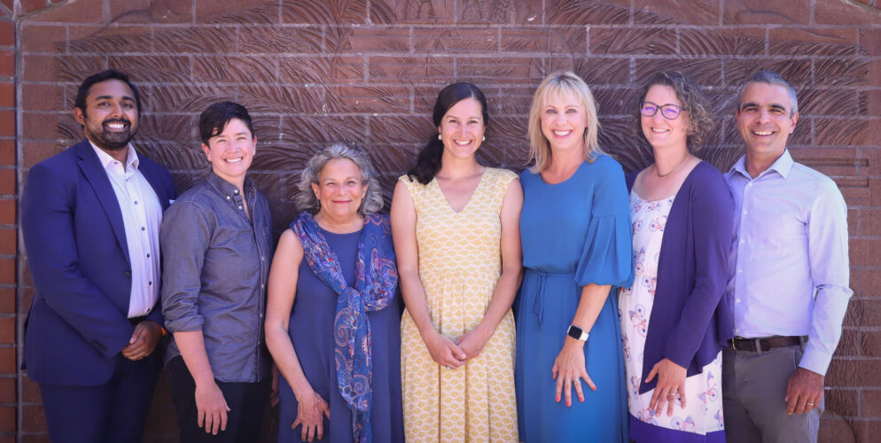 Gena R. Goodman-Campbell ’06, center, and Megan Perkins ’98, third from right, are serving together on the Bend, Oregon, City Council. Gena became Bend’s mayor on May 18, 2022, after her fellow city councilors appointed her to serve out the remainder of the former mayor’s term. Gena and Megan enjoy working together on challenging issues such as homelessness and equity, and thwarting constant sabotage attempts by a fellow city councilor who is a DU alumna.