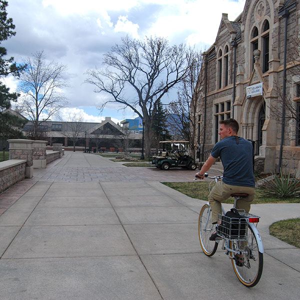 Student riding bike