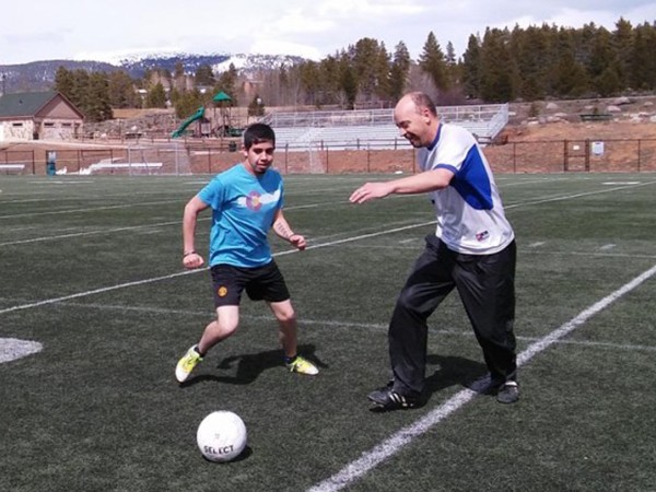 Peter Frykholm '92 playing soccer